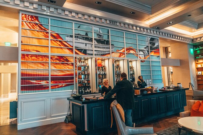 Phantoms of Prohibition: Ghosts Cocktails & Bites Walking Tour - The Omni Louisville’s speakeasy and bowling alley