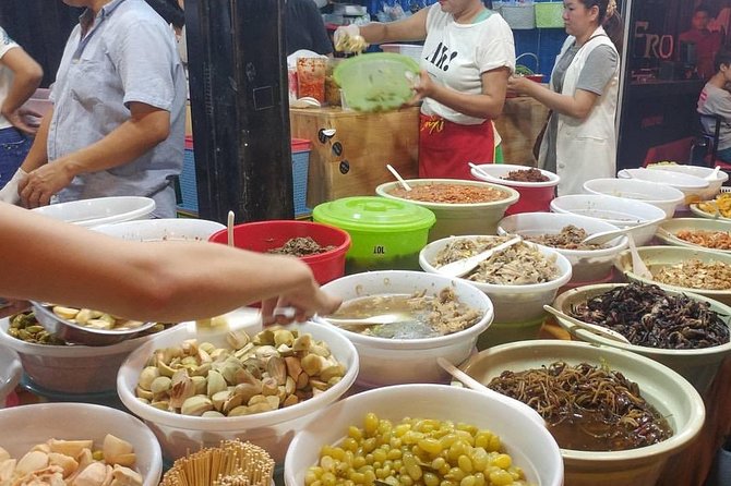 Phnom Penh Nightlife Street Food Tours - Kandal Market: follow the smoke and grilling