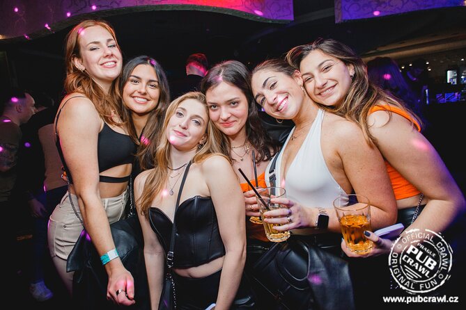 Prague Pub Crawl with Unlimited Drinks & 5 story club Entry - Moving through the bars and collecting free shots