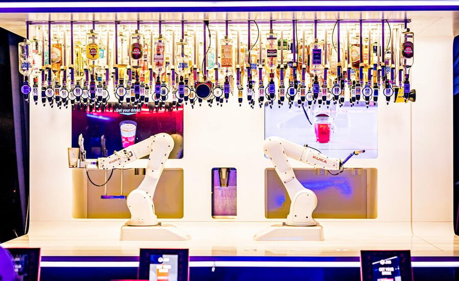 Prague: Robotic Bar Entry with a Drink Included - Watching the robotic arms work