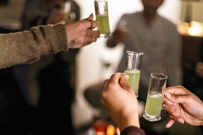 Private Night Bar Crawl in Lisbon with Local Guide and Drinks - Starting with stories at Largo do Carmo