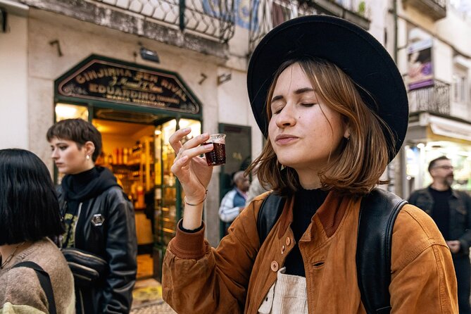 Private Night Bar Crawl in Lisbon with Local Guide and Drinks - Walking into Bairro Alto at 9 p.m.