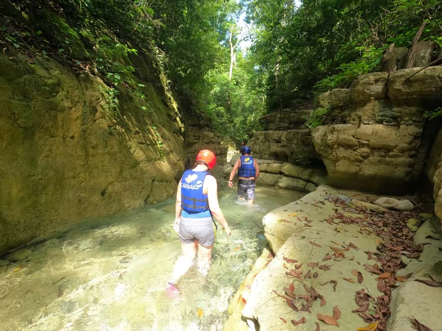 Puerto Plata: Damajagua Waterfalls Canyoning & Cocktail - Swimming through the Damajagua canyon