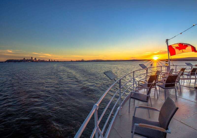 Québec City: 2-Hour Cocktail & DJ Evening Cruise - Québec City from the water after dark
