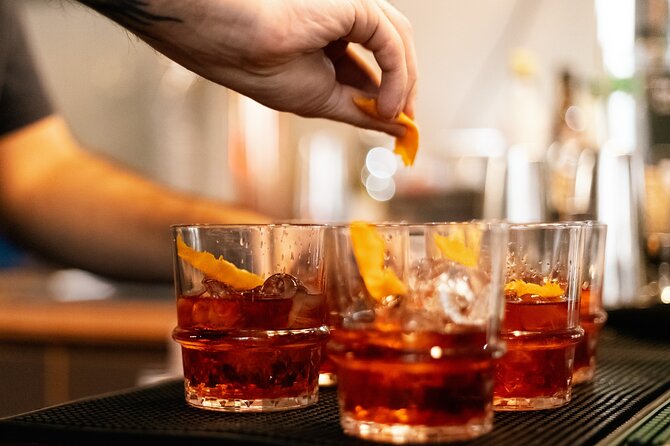 Rome Bar Crawl: Interactive Night Tour with Games and Karaoke - Walking Via dei Fori Imperiali at night