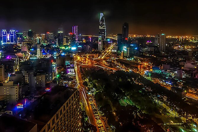 Saigon After Dark With Seafood, Beer & Live Music Bar - Ho Thi Ky Flower Market after sunset