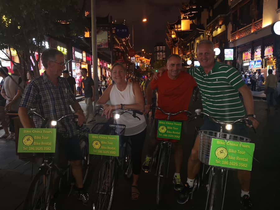 Shanghai: 4-Hour Nightlife Adventure & Tasting Bike Tour - Jing’an and the return through the city