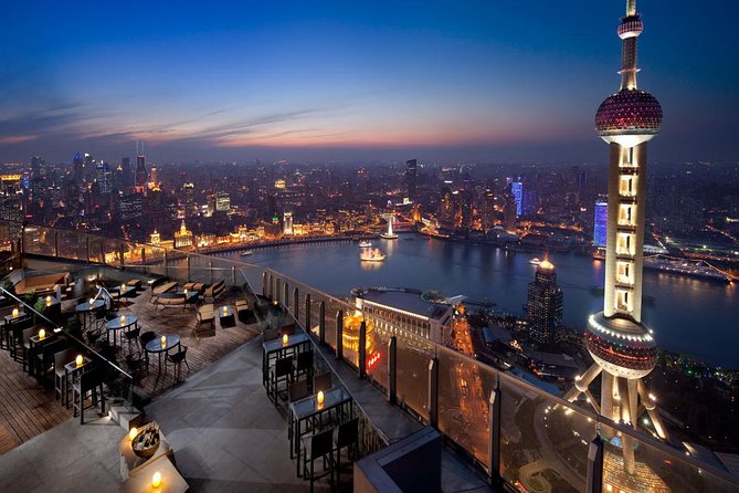 Shanghai Authentic Dinner and Night River Cruise with Rooftop Bar Hopping Option - The Shanghai dinner: soup dumplings and local dishes