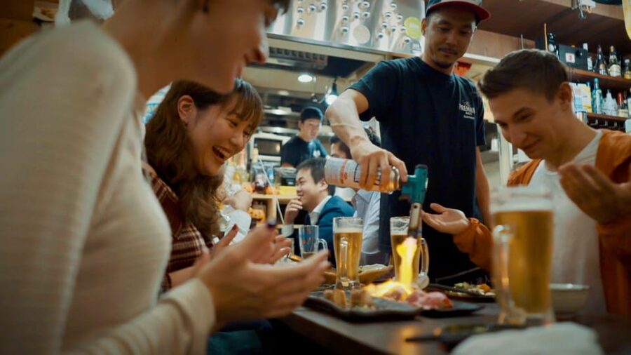 Shibuya Meltdown Night Tour: All-You-Can-Drink Bar Hopping - The first izakaya: beer, grilled food, and an easy start