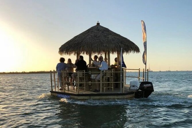 Tiki Boat - Clearwater - The Only Authentic Floating Tiki Bar - Cruising past beach homes, boats, and Gulf views