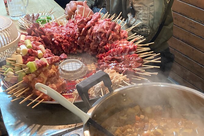 Tokyo Shinjuku Japanese Local Bar Hopping and Food Tour - Kabukicho after dark: neon, nightlife, and a sharper edge