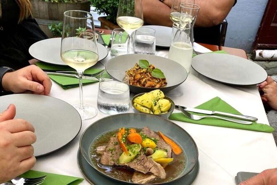 Vienna Nightlife Tour: Dinner, Drinks & Rooftop Bar - Ending above the city or along the river